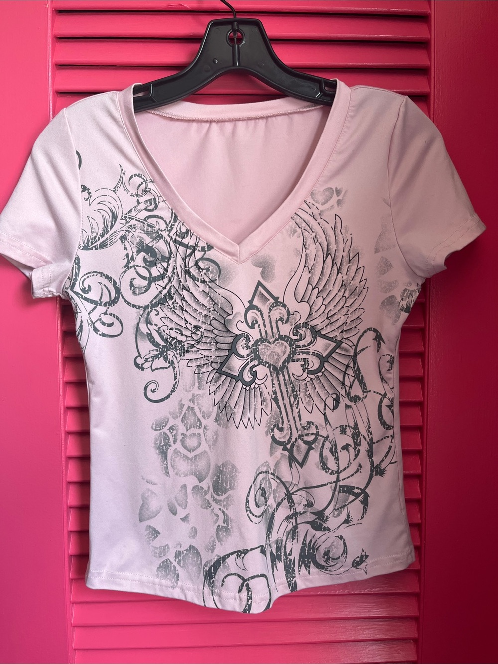 Women's Pink V-Neck Graphic Tee with Winged Cross Motif